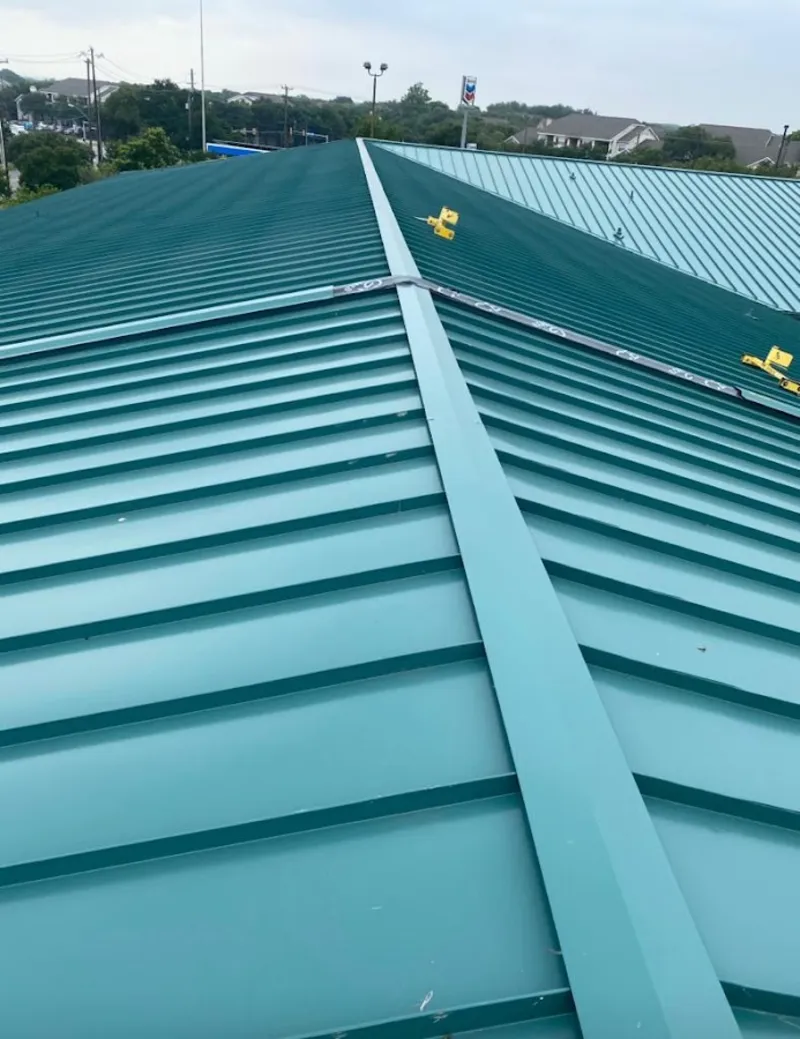 Green commercial metal roof ridge and valley for Metal Roof Repair in Lake Forest