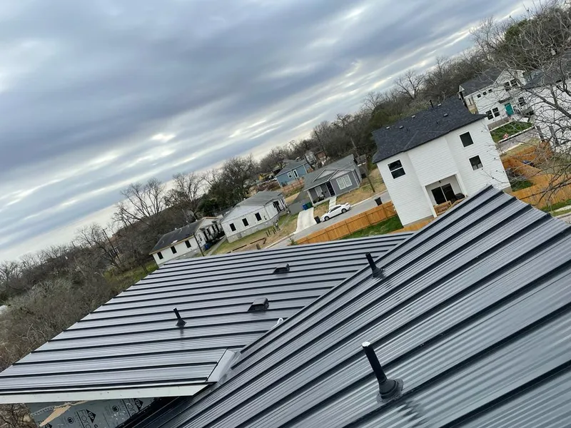 Standing seam metal roof panels with vents for Skylight Repair in Lake Forest